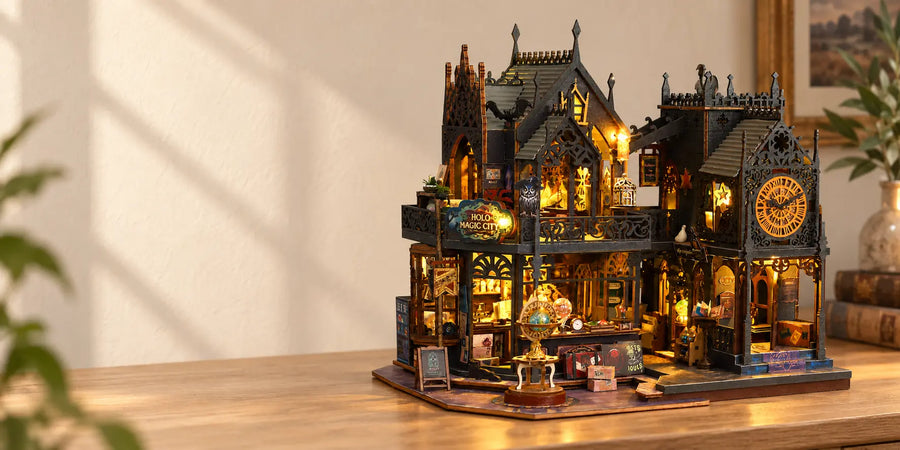 Illuminated Holo Magic City miniature house on a wooden table