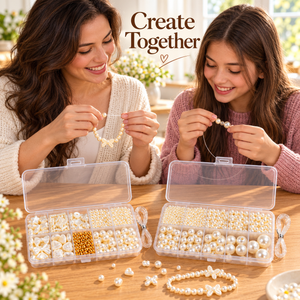 Two people making faux pearl bracelets together with the two-box kit