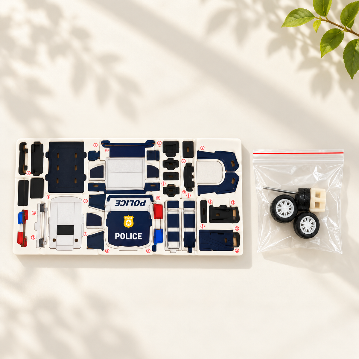 Blue and white police car wooden DIY assembly kit - Sunlight Kit Flatlay