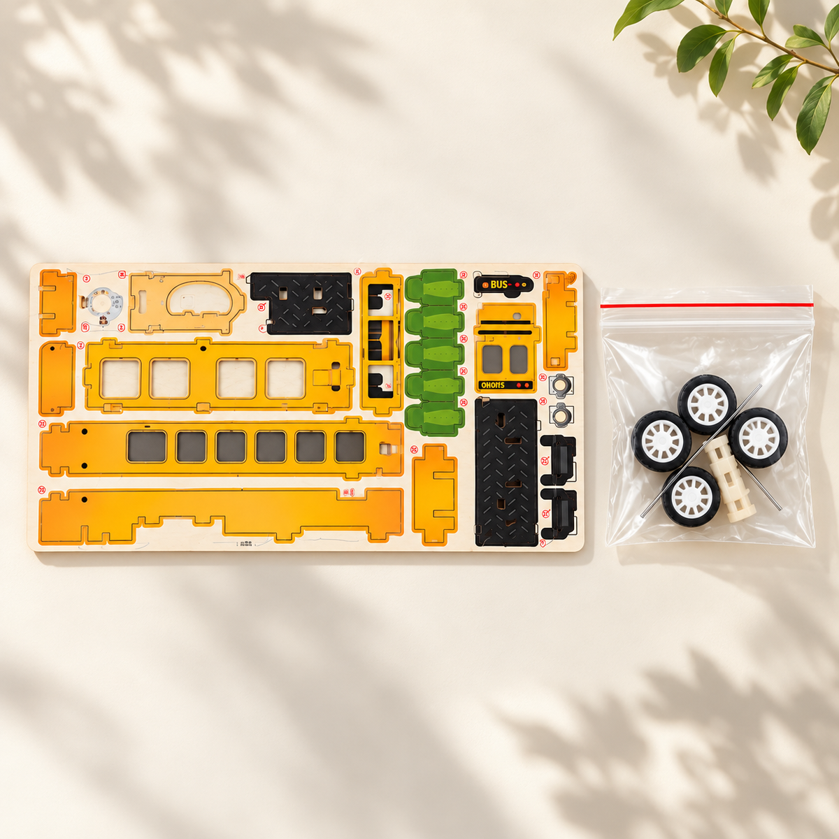 Yellow school bus wooden DIY assembly kit - Sunlight Kit Flatlay